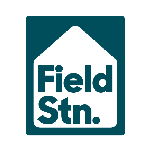 A blue and white logo for field stn.