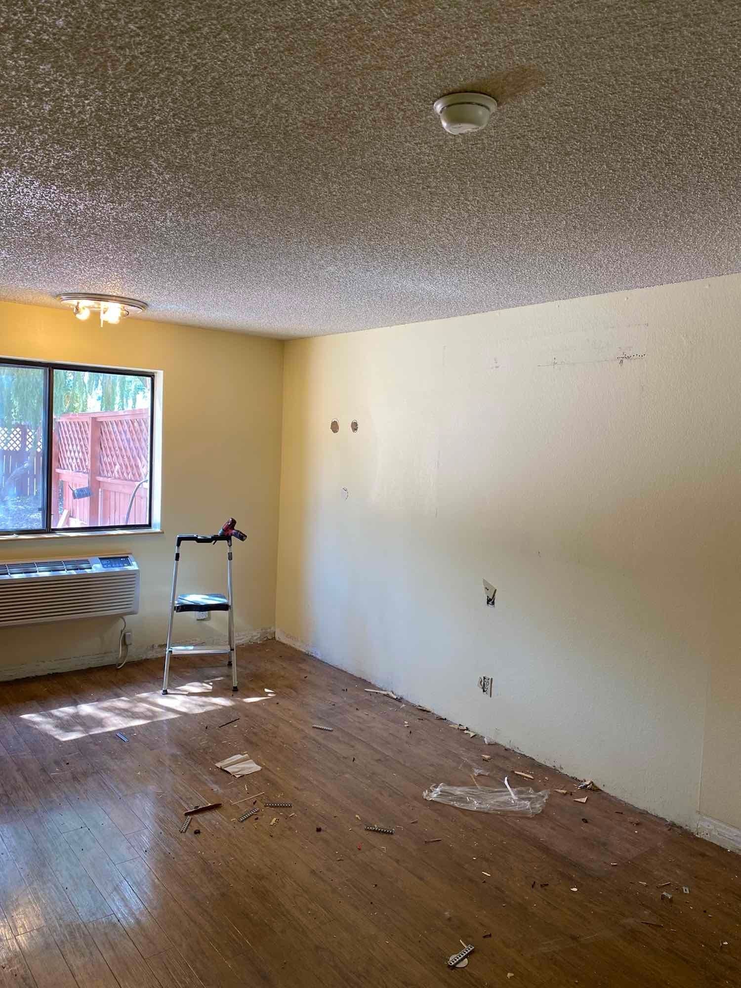 There is a walker in the middle of the room.