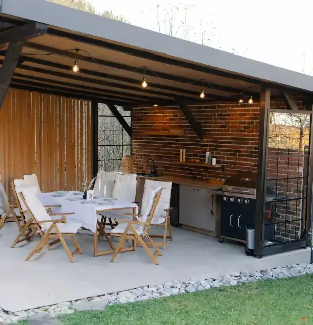 Bistro and patio lighting creating a warm atmosphere in an outdoor living area in Fort Myers, FL