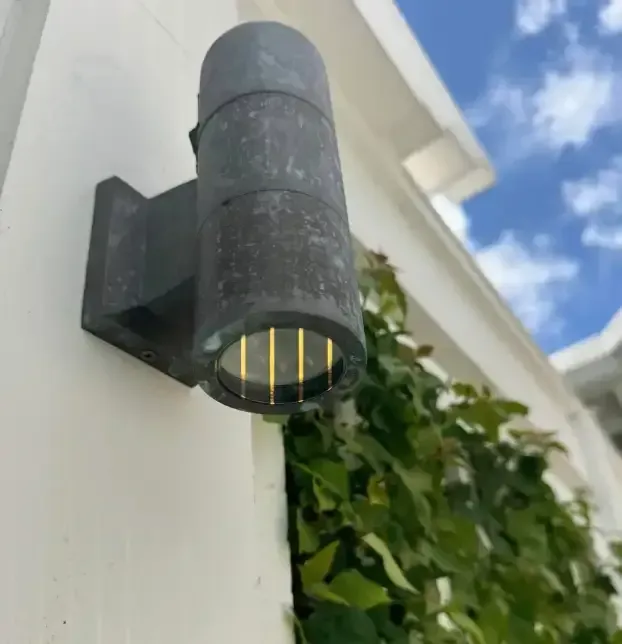 Outdoor landscape lighting fixtures being serviced and maintained in Fort Myers, FL
