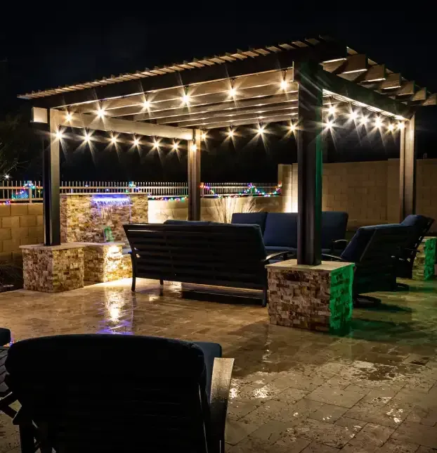 Patio string lighting installed to illuminate an outdoor entertaining space in Fort Myers, FL