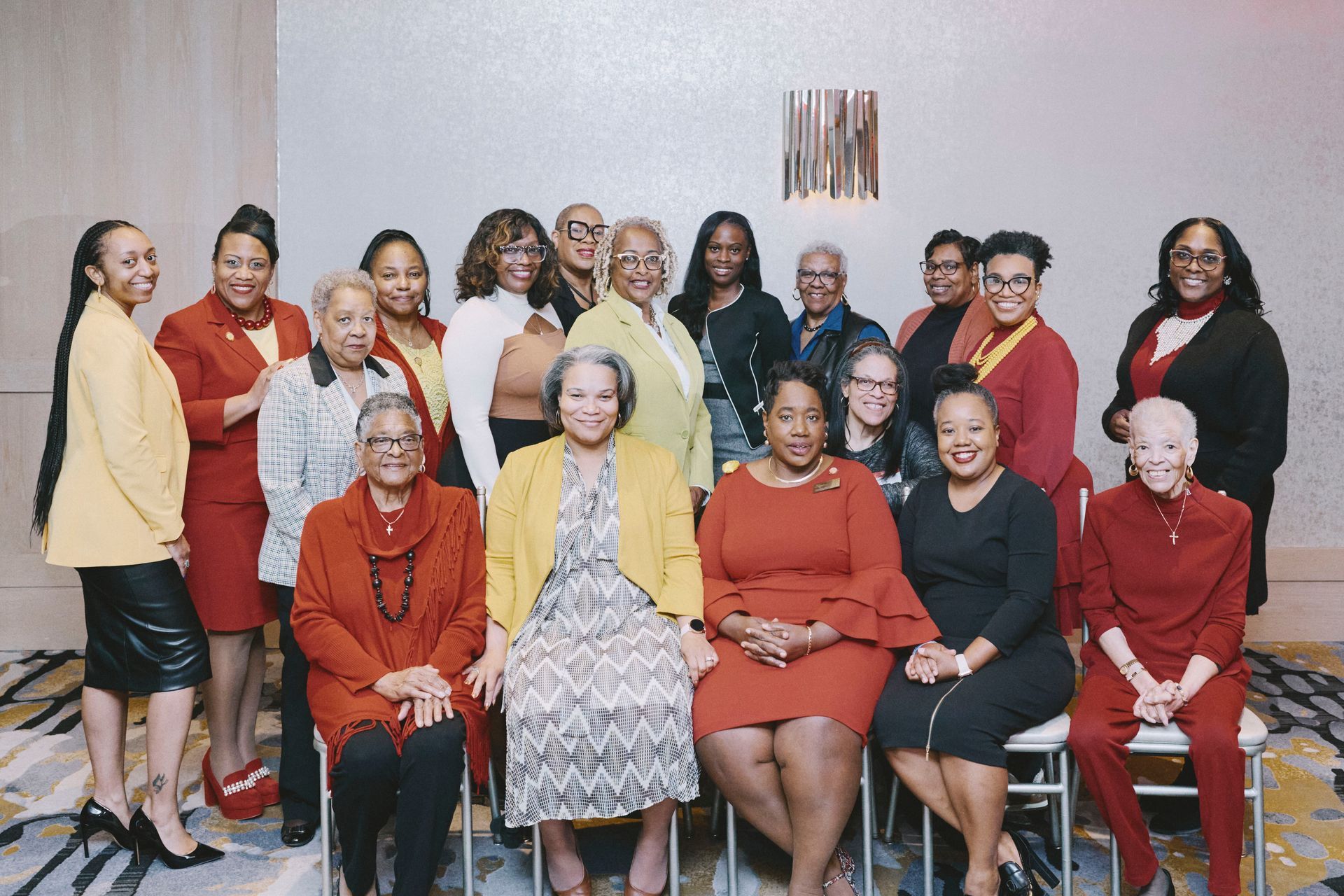 A group of women are posing for a picture together.