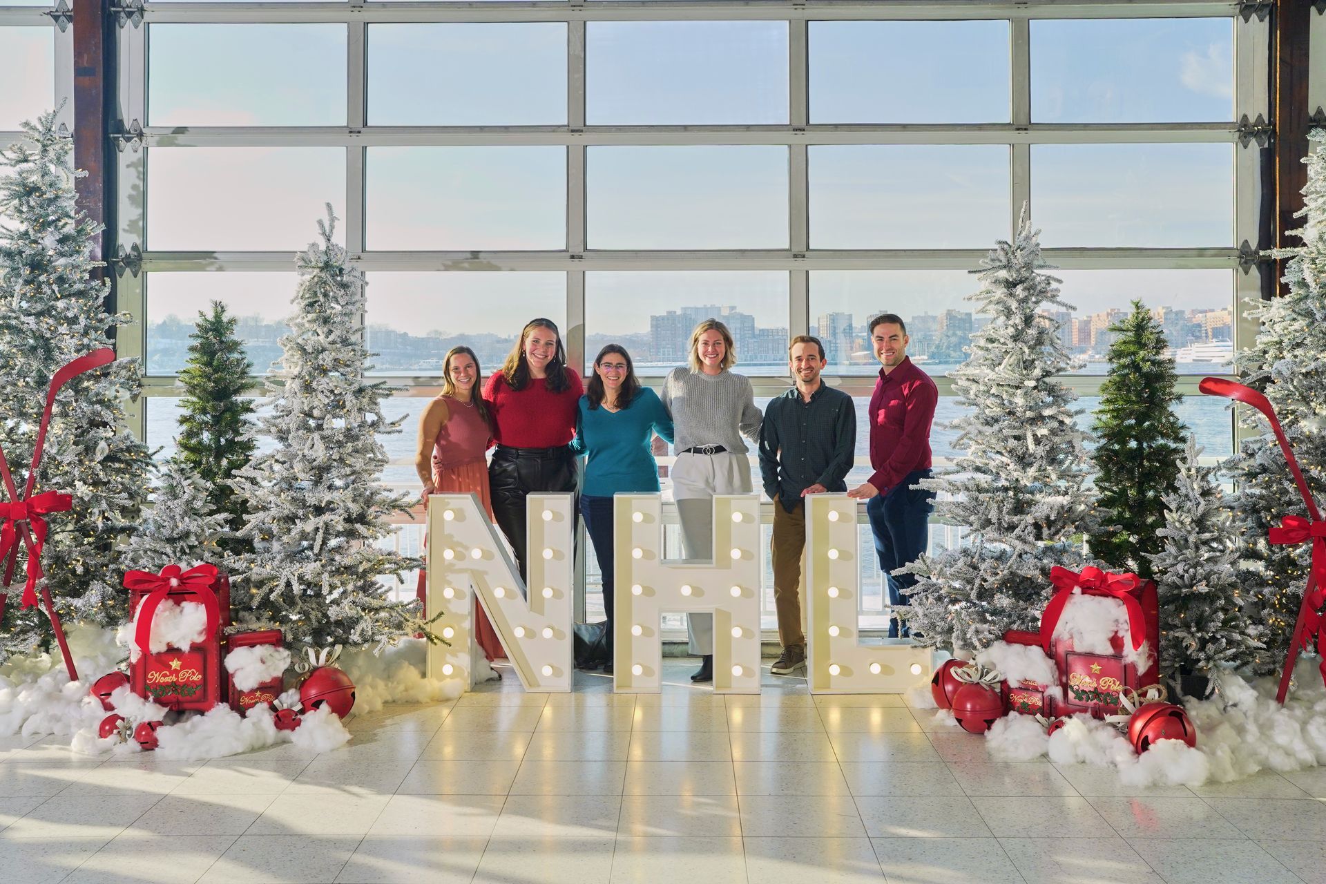 Group poses by lit-up 