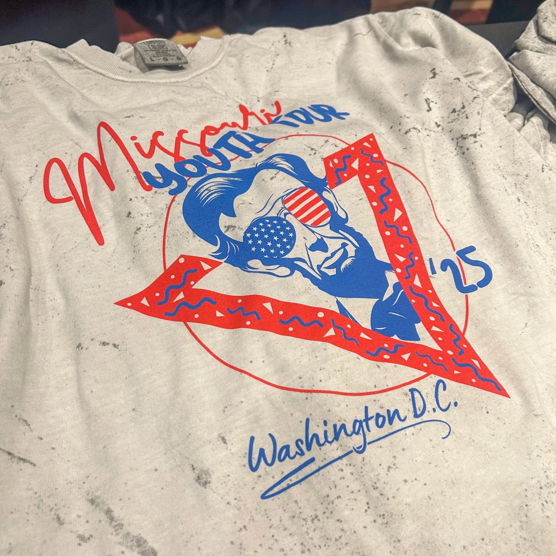 White T-shirt with a red, blue, and white Washington, D.C. graphic and text in handwritten-style print