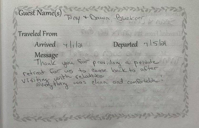 Handwritten guest note on a bordered card with arrival and departure dates.