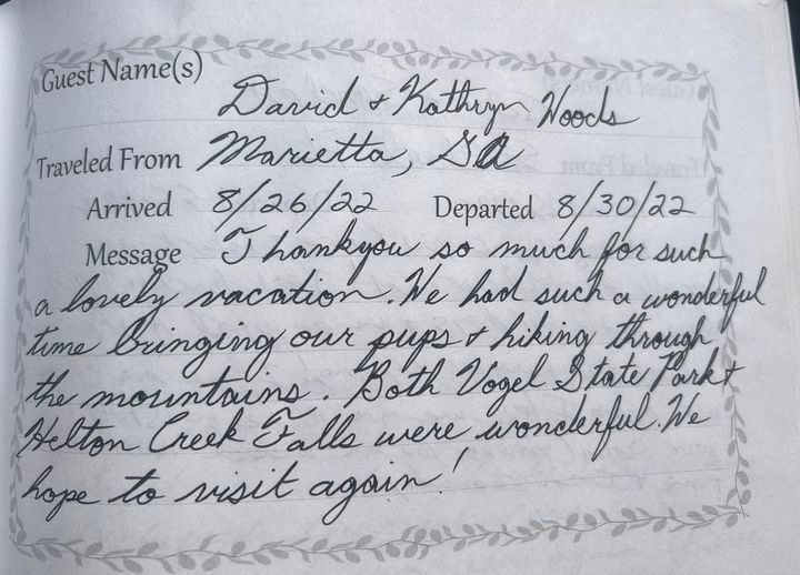 Handwritten guest note from Daniel and Kathy Hood thanking for a wonderful time at a resort near Black Creek Falls