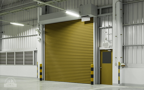 Reflective garage door with white horizontal panels on a suburban house.