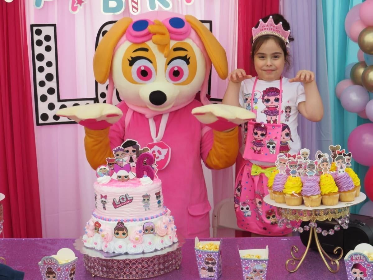 Pink Dog Mascot in Birthday Party