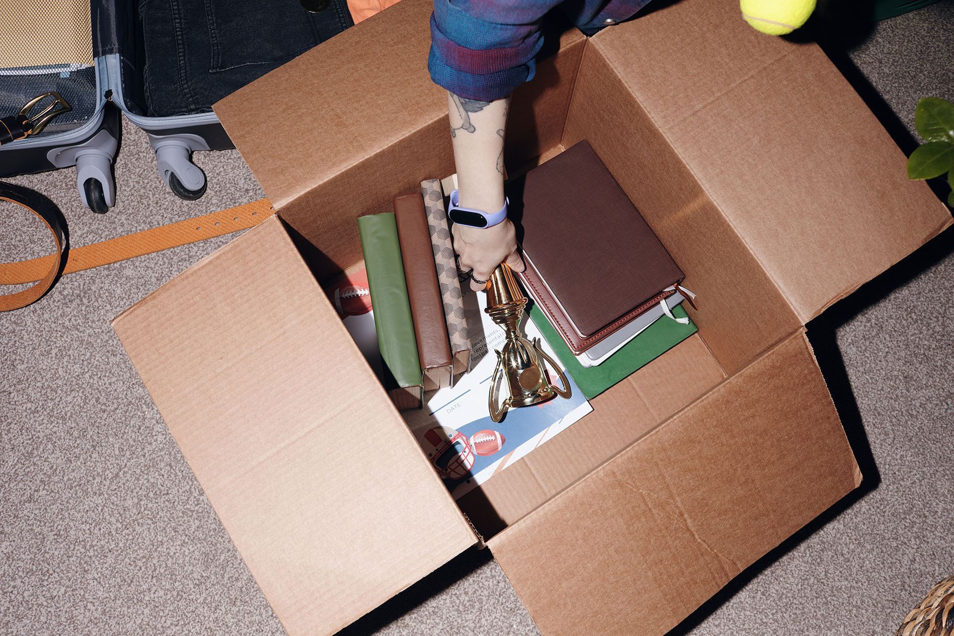 Boxing keepsakes and photos for self storage in Burlington NC