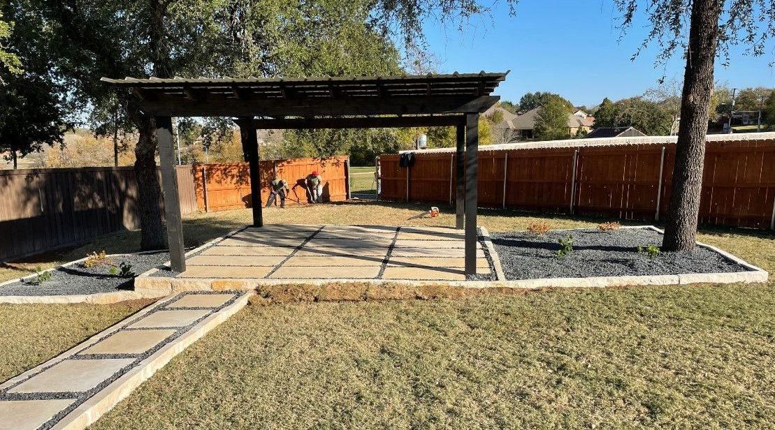 Pergola with limestone slab patio and walkway