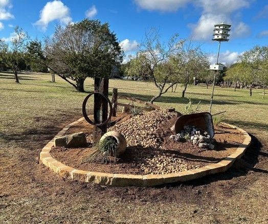 Western style xeriscape landscape bed