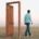 A blurry picture of a person standing in front of a door.