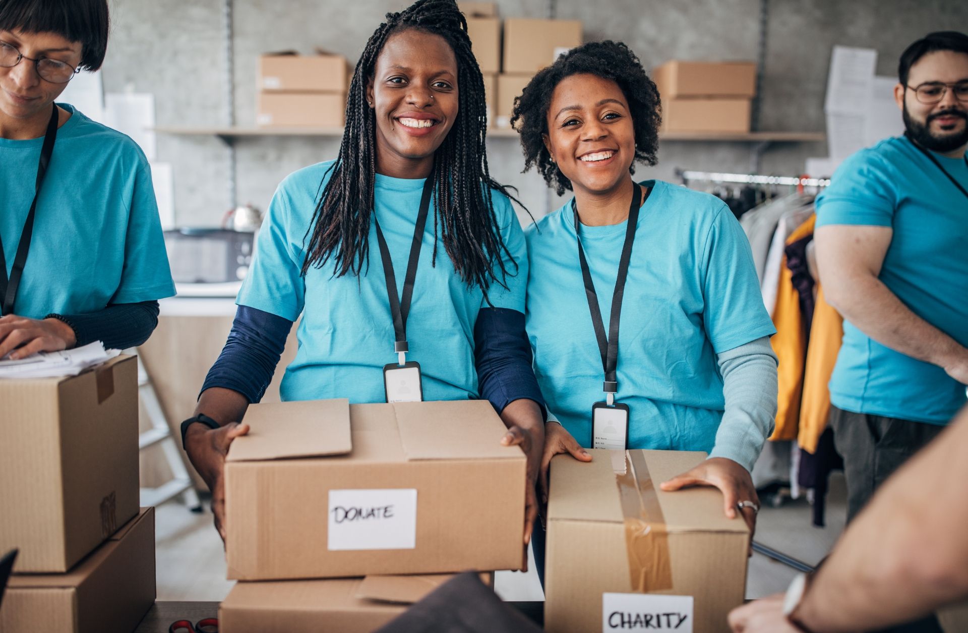 Your Helpful Neighbors team donating sorted items to a local Michigan charity after an estate cleanout.