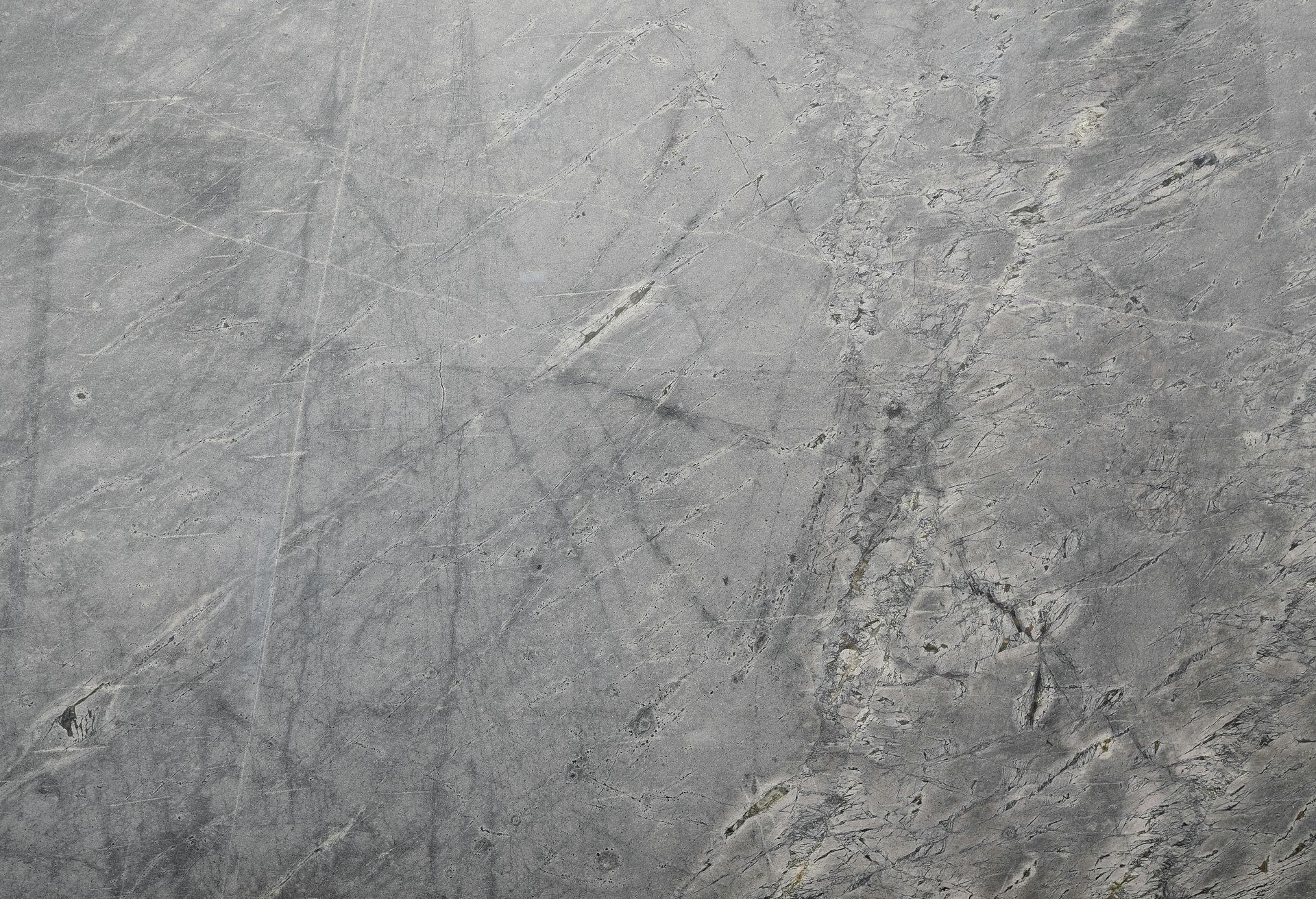 A close up of a gray concrete surface.
