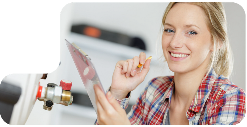 A Rothwells Heating engineer servicing a home heating system.