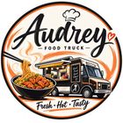 Audrey Food Truck logo with orange-black truck, chef hat, and bowl of saucy food, “Fresh Hot Tasty” text