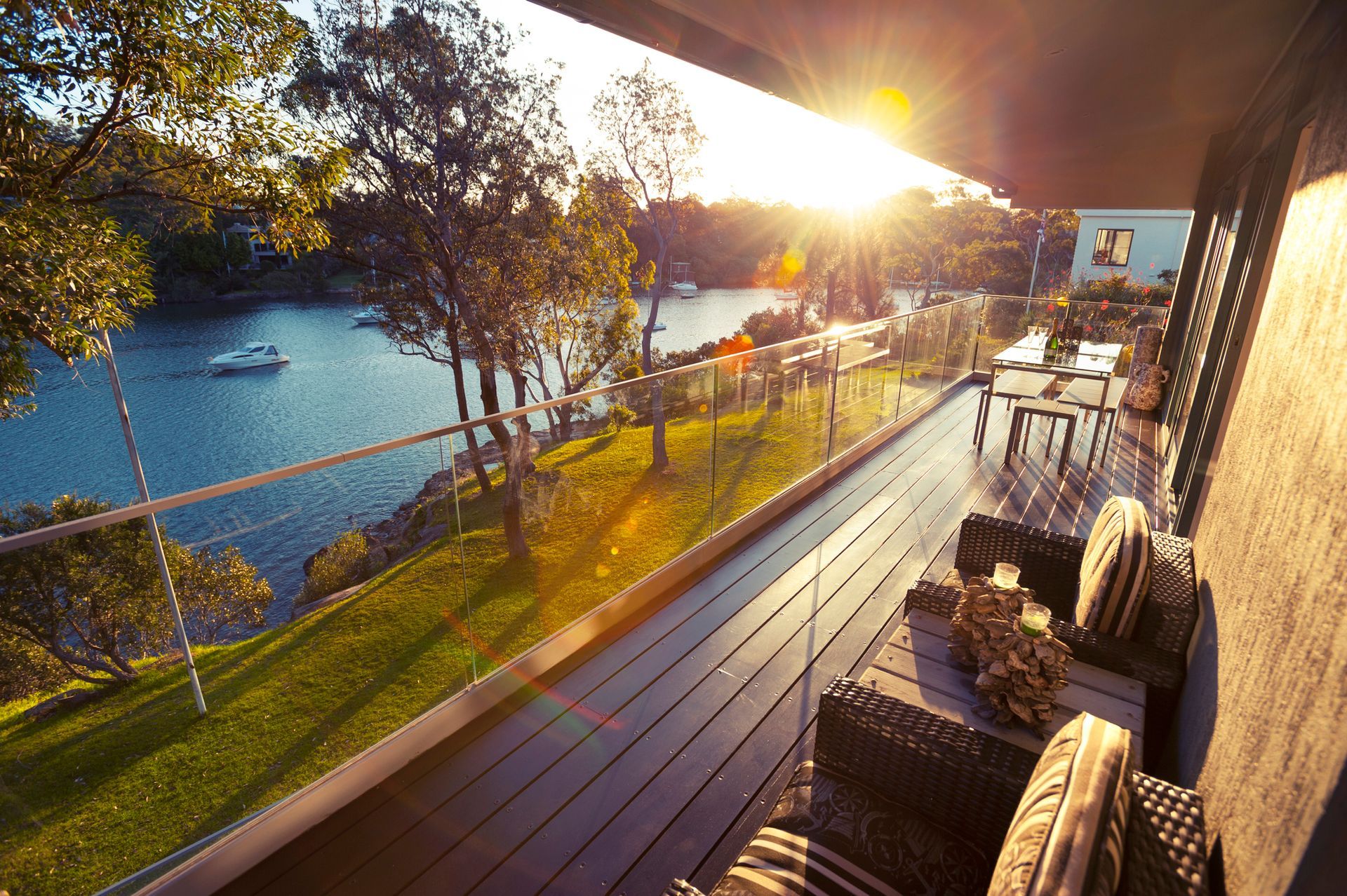 A balcony with a view of a body of water