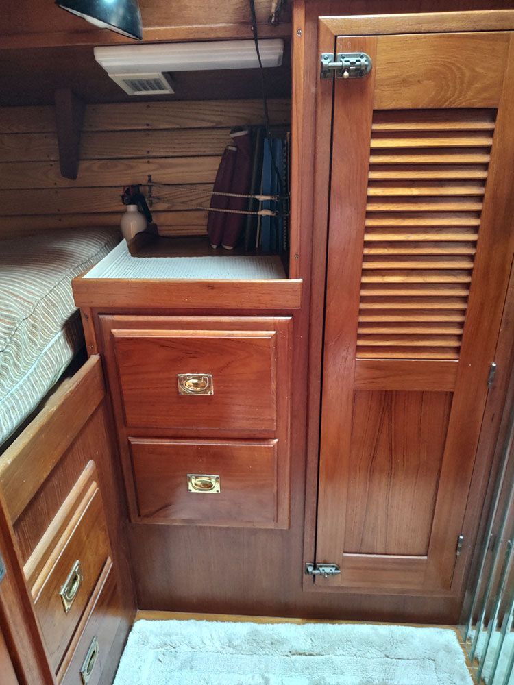 Aft Cabin sports 4 drawers and a drop down storage Plus a cedar hanging locker