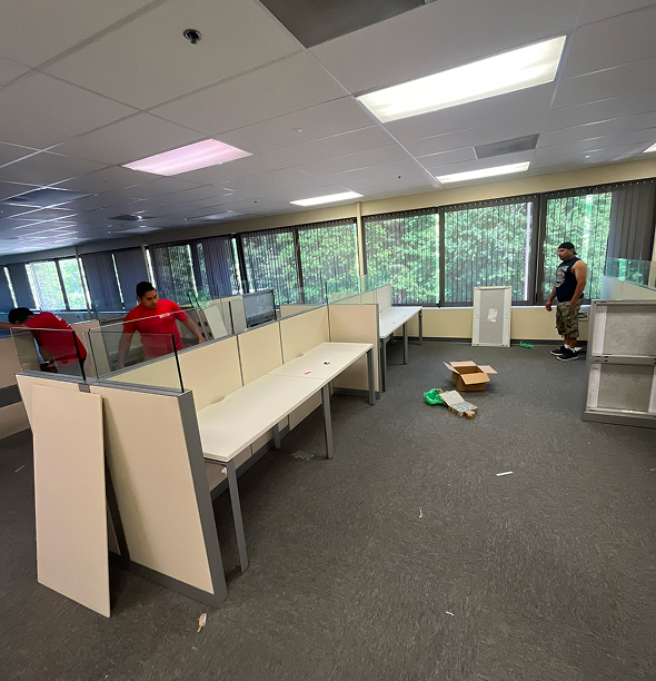 Smooth Move & Delivery team performing a professional office move in Stamford, handling office furniture and cubicle relocation.