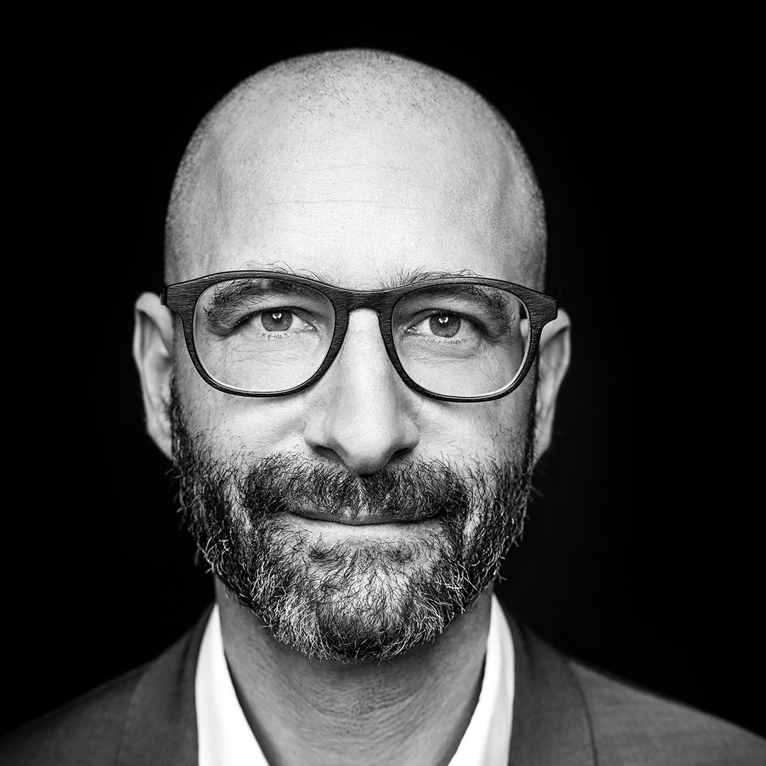 Black and white portrait of Adrian Stettler