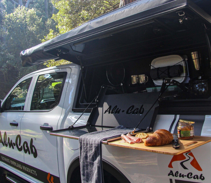 A White Truck with the Word Alu Cab on the Side - Whitsunday 4x4 & Automotive In Cannonvale, QLD
