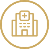 Gold hospital icon inside a gold circle on a white background