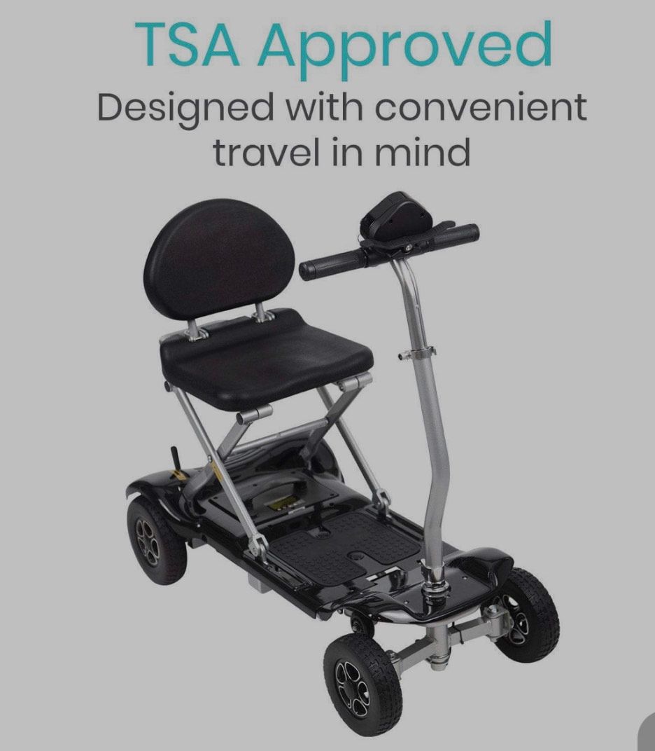 A black, foldable, four-wheeled travel mobility scooter against a gray background with the text 