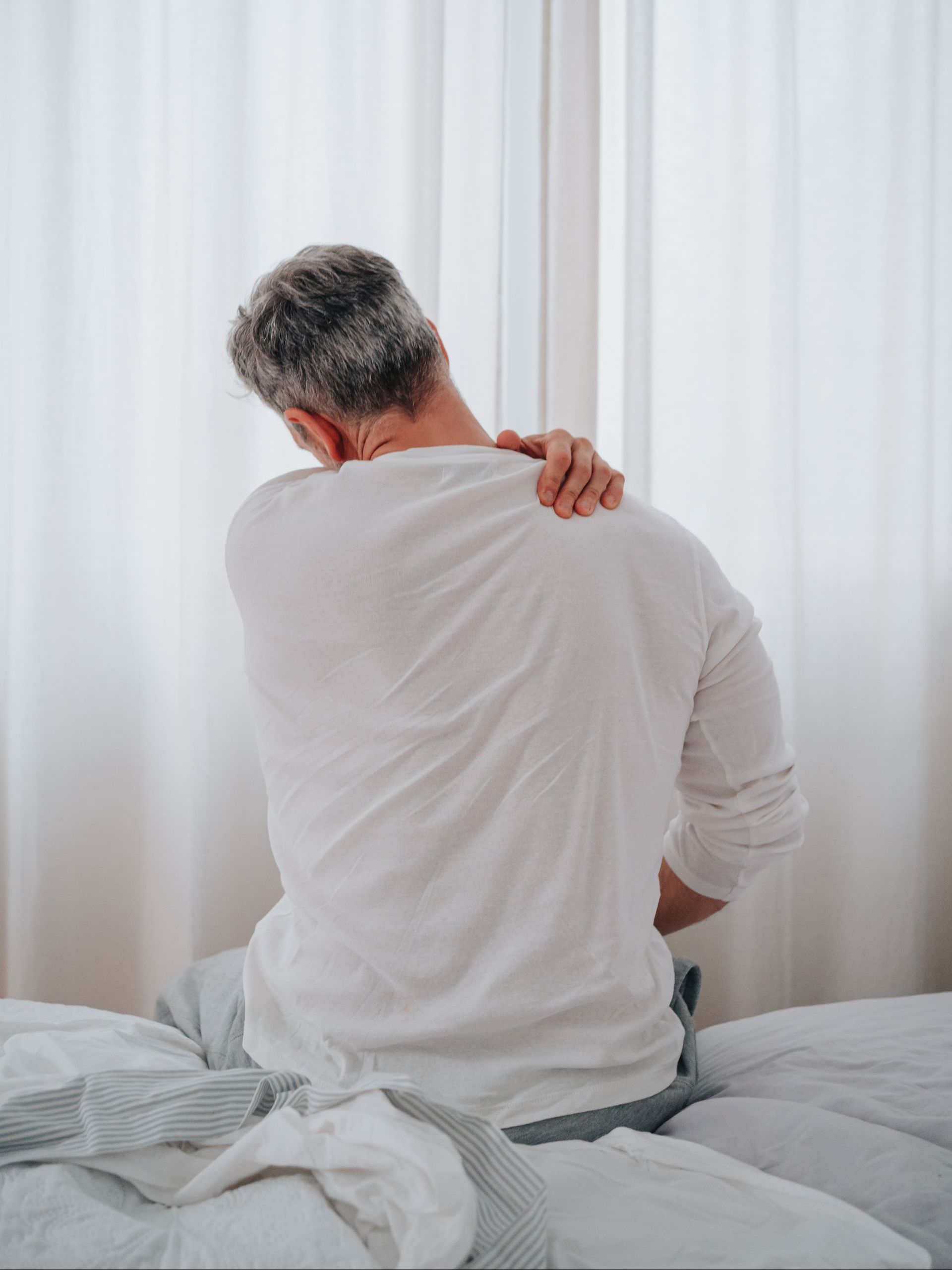 man with neck pain