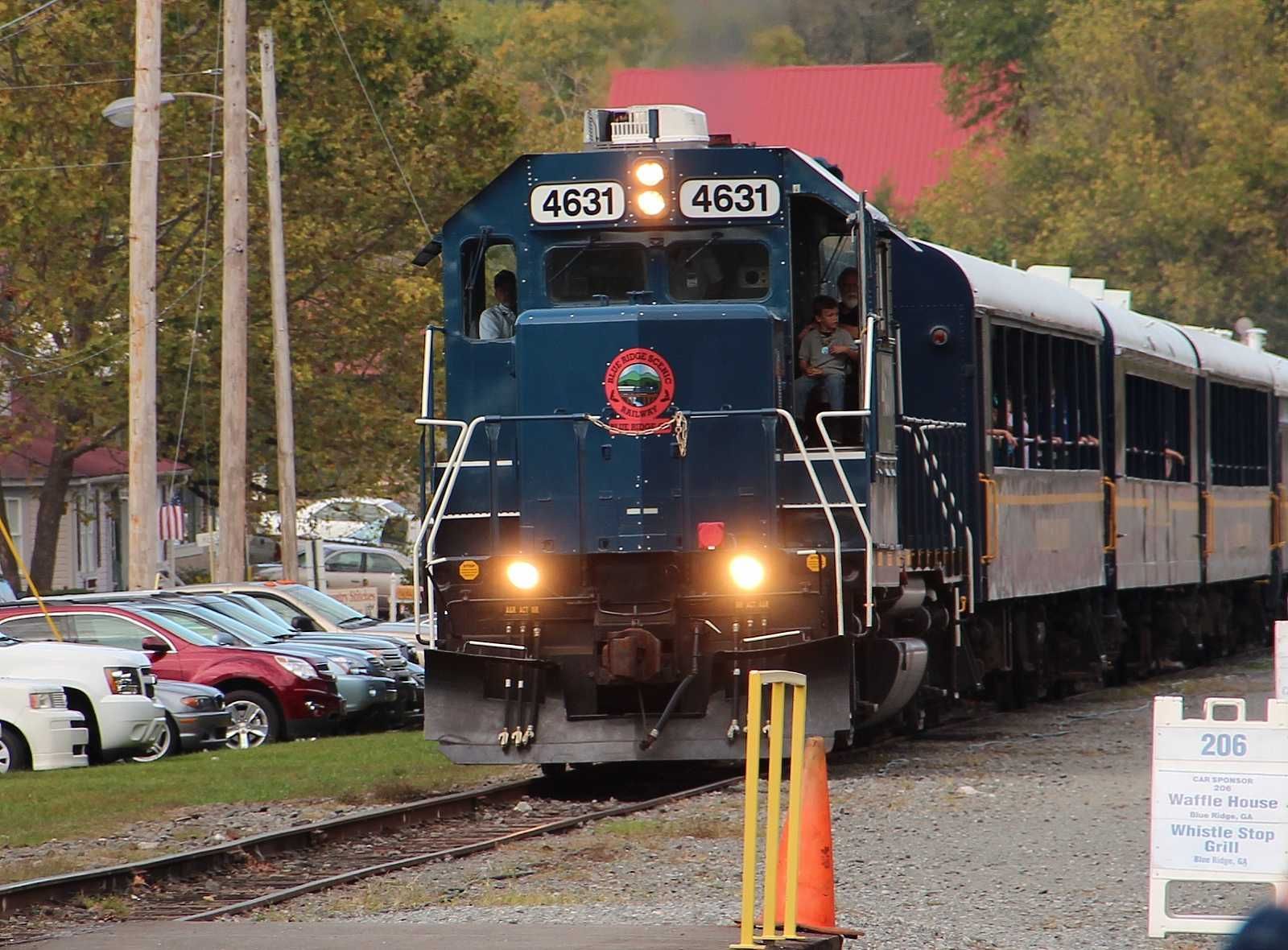 A blue train with the number 4831 on the front