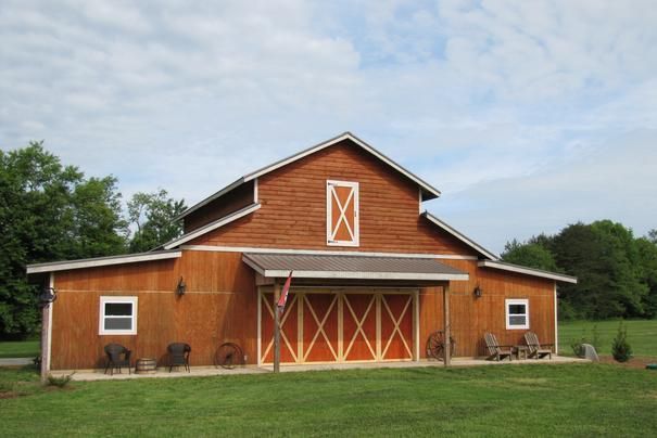 A red barn with a white x on the front