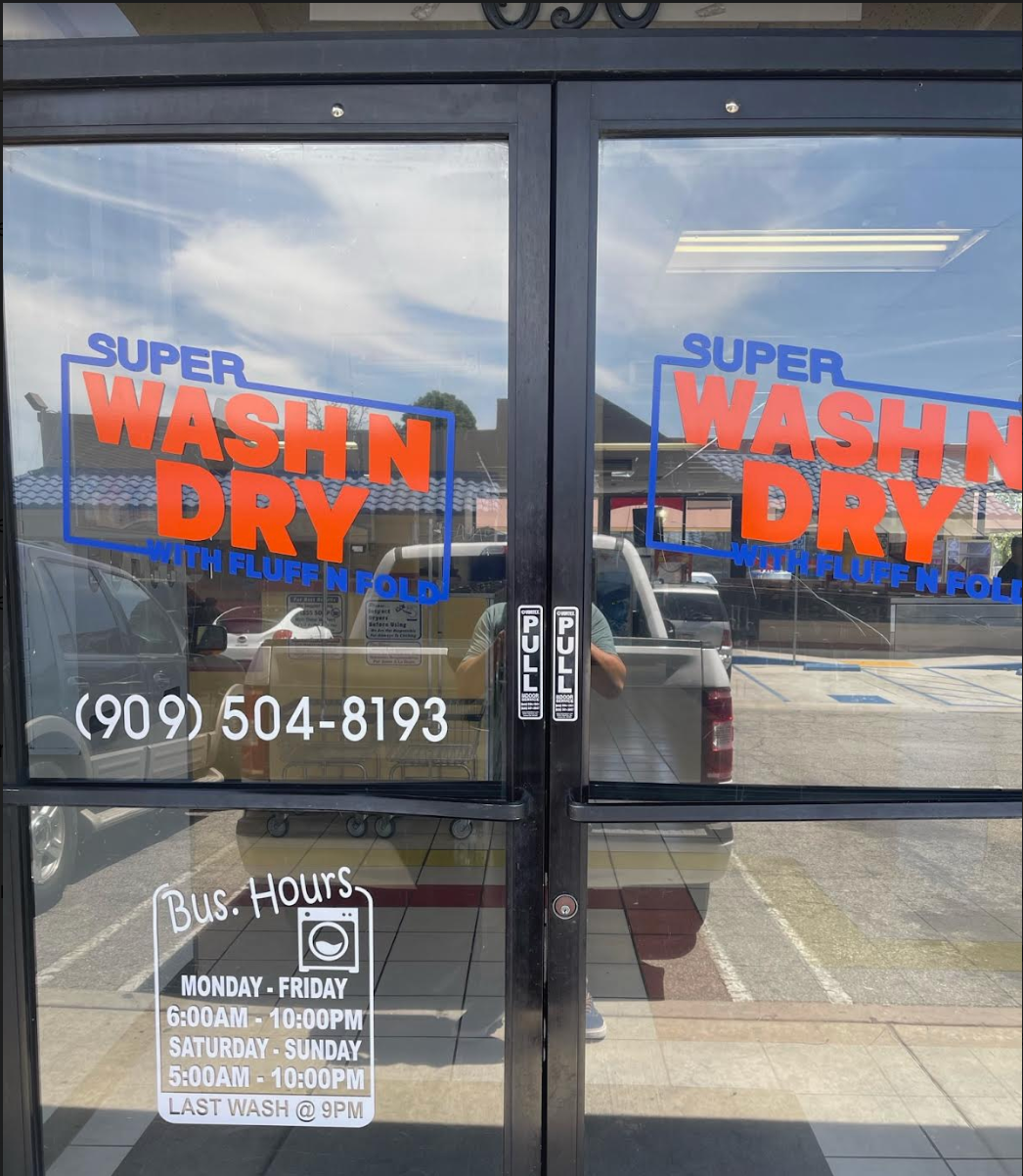 Double doors of a laundromat,