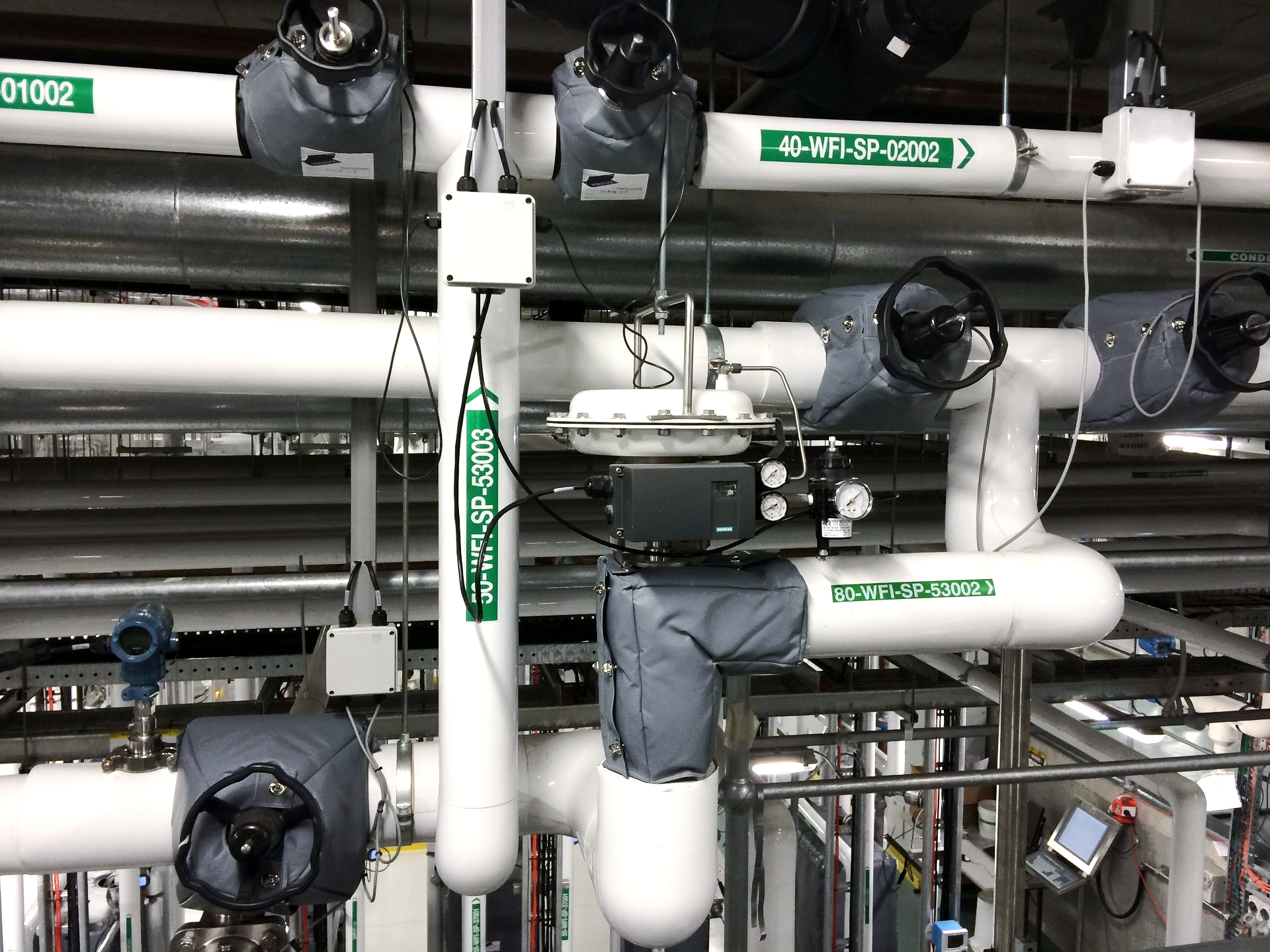 Insulock Thermocovers and PVC piping over industrial equipment