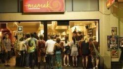 A Group Of People Are Standing Outside Of A Restaurant — The Garis Group In Hamilton, NSW A Group Of People Are Standing Outside Of A Restaurant — The Garis Group In Hamilton, NSW