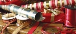 There Are Many Different Types Of Ribbons And Wrapping Paper On The Table — The Garis Group In Hamilton, NSW There Are Many Different Types Of Ribbons And Wrapping Paper On The Table — The Garis Group In Hamilton, NSW