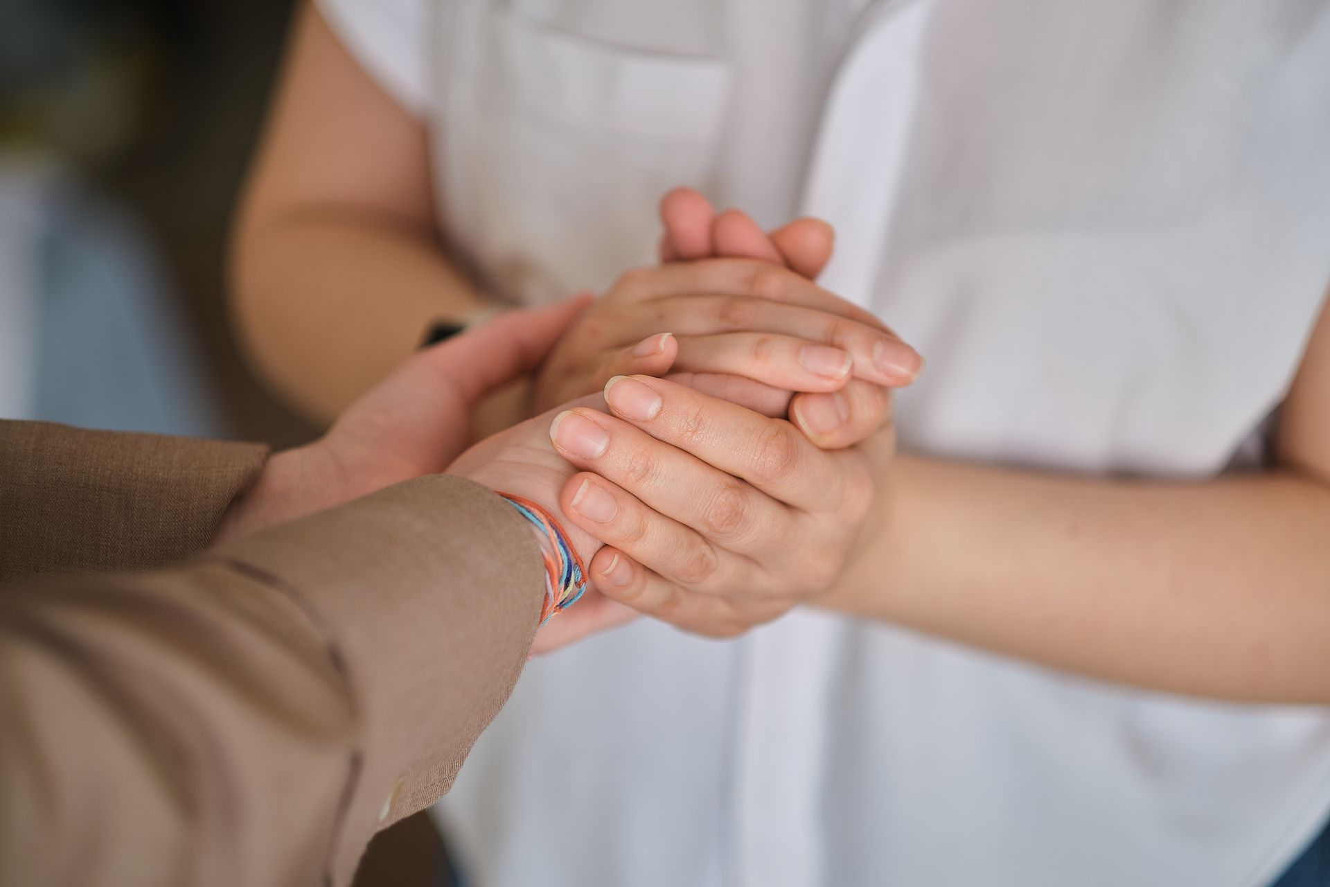 two people holding hands spiritually