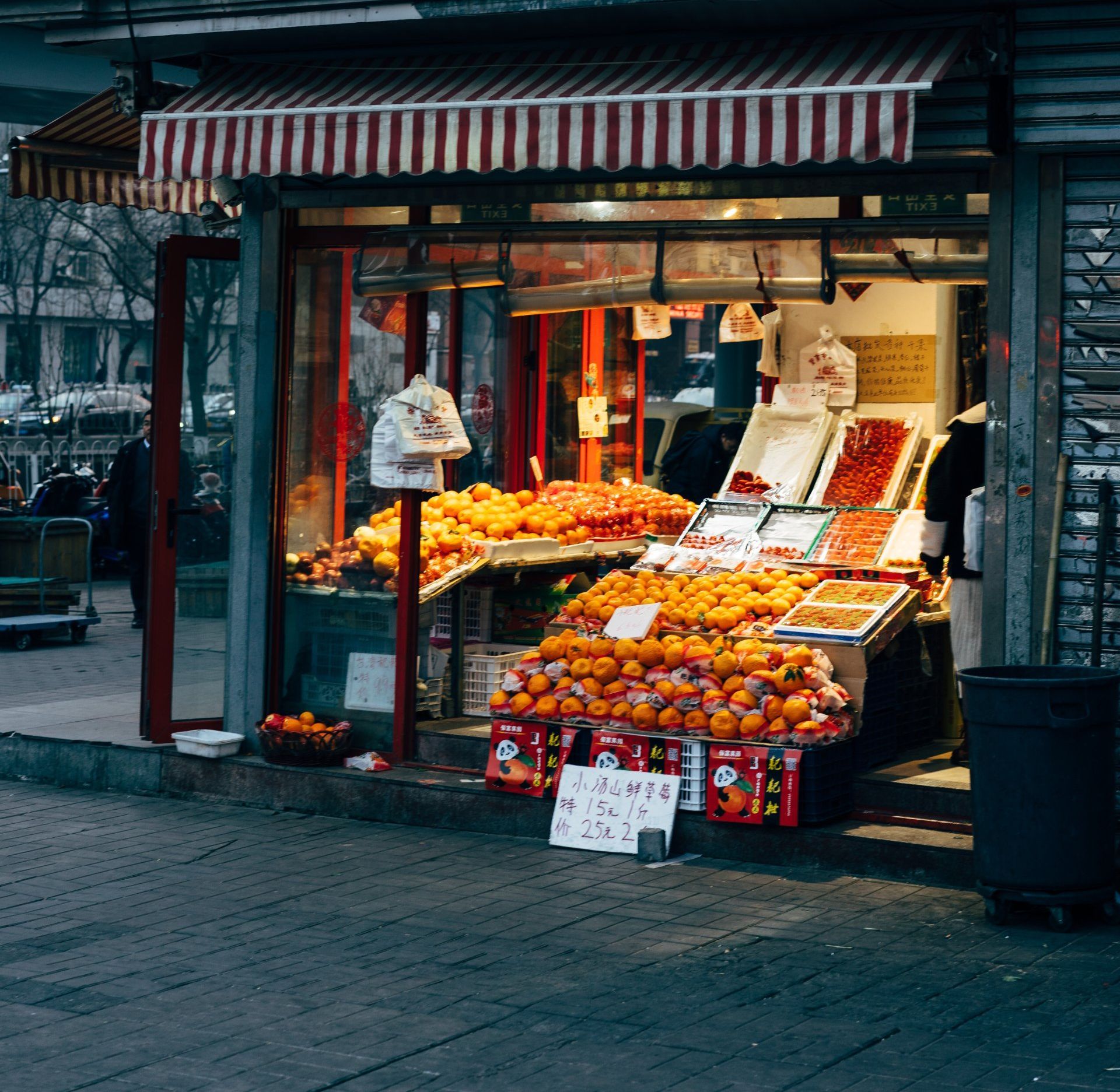 a fruit stand with a sign that says ' a ' on it