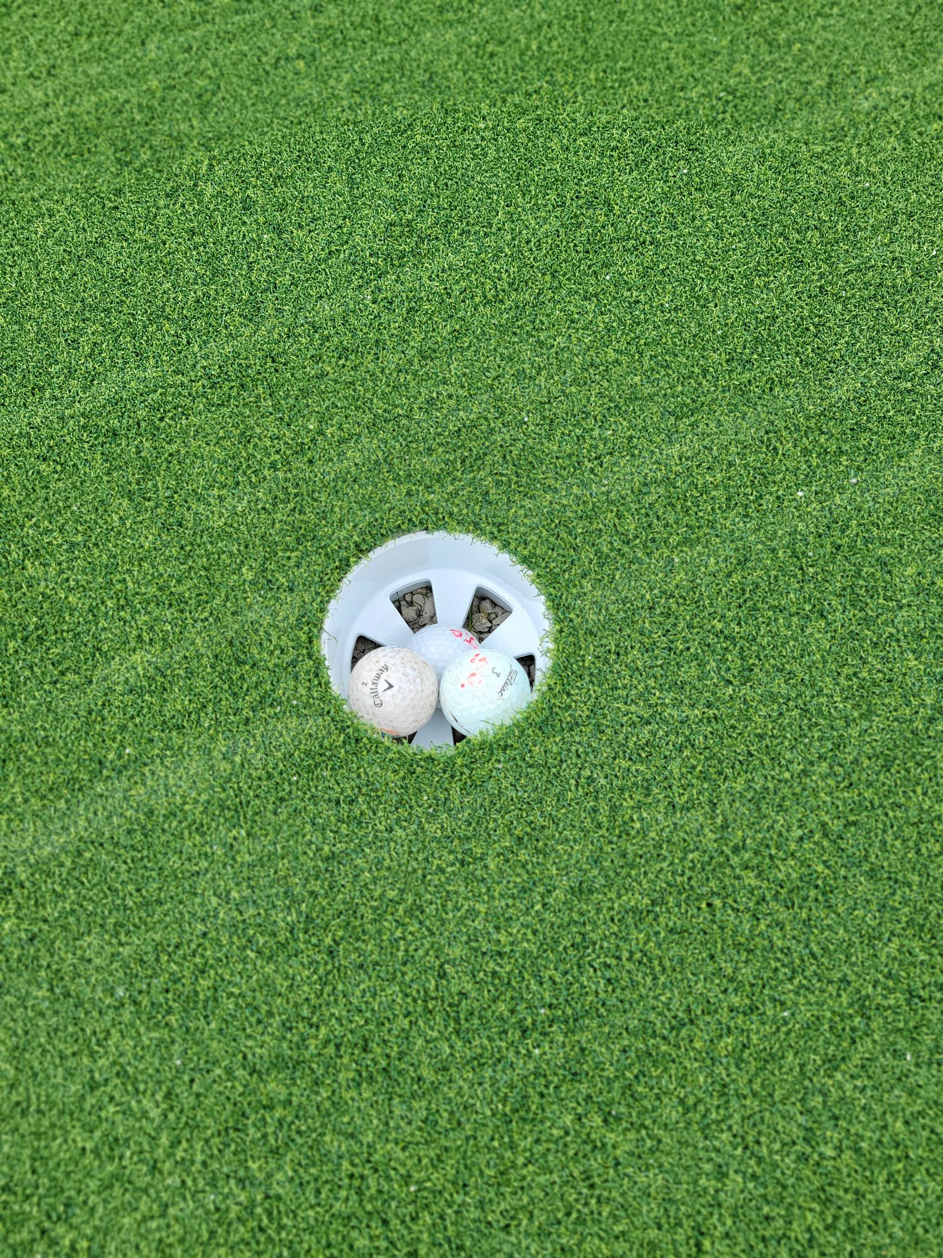 synthetic putting green cup