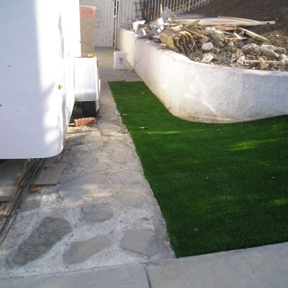 synthetic grass around planter