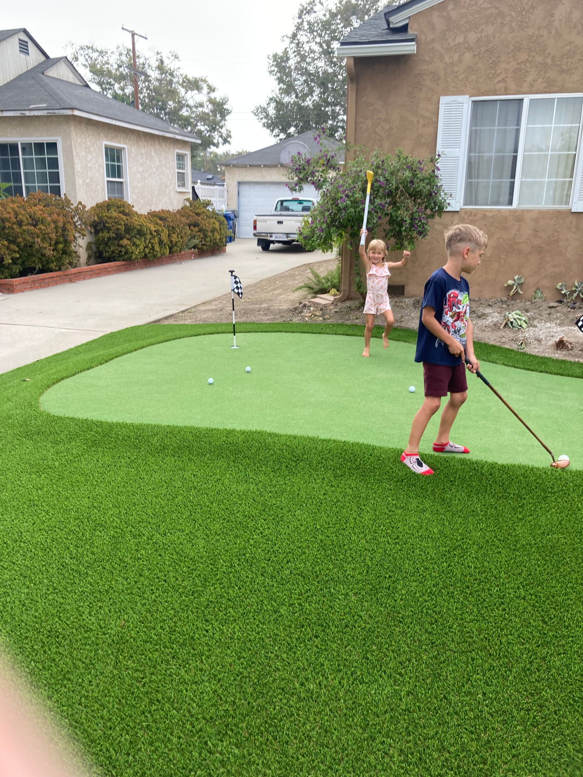 paddle board on synthetic turf