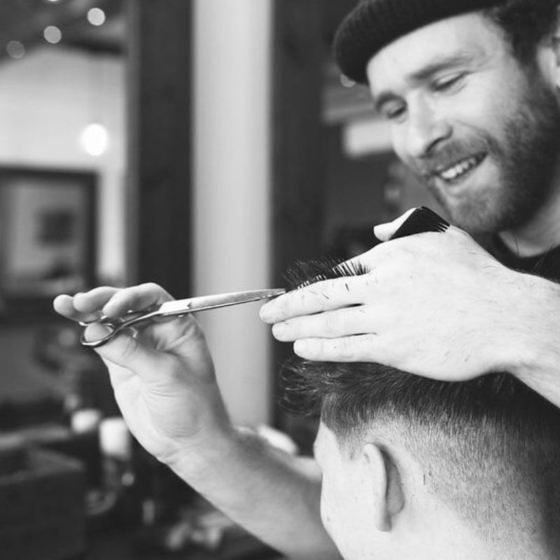 kier cutting hair at the swaffields wimborne barbers