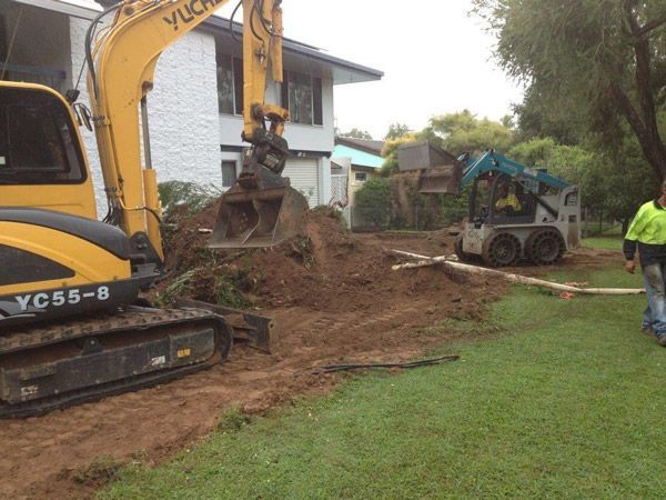 A yellow excavator with the number yc55-8 on it