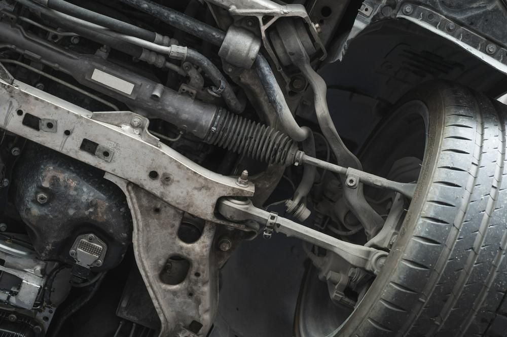 A Close up Of the Underside of A Car with A Tire — TGR Automotive–Honda Specialist in Lismore, NSW