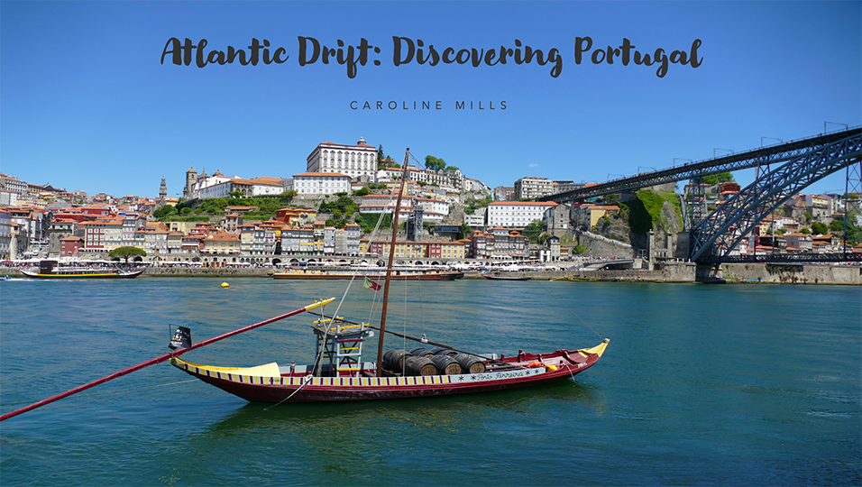 A boat in the water with the words atlantic drift discovering portugal on the bottom