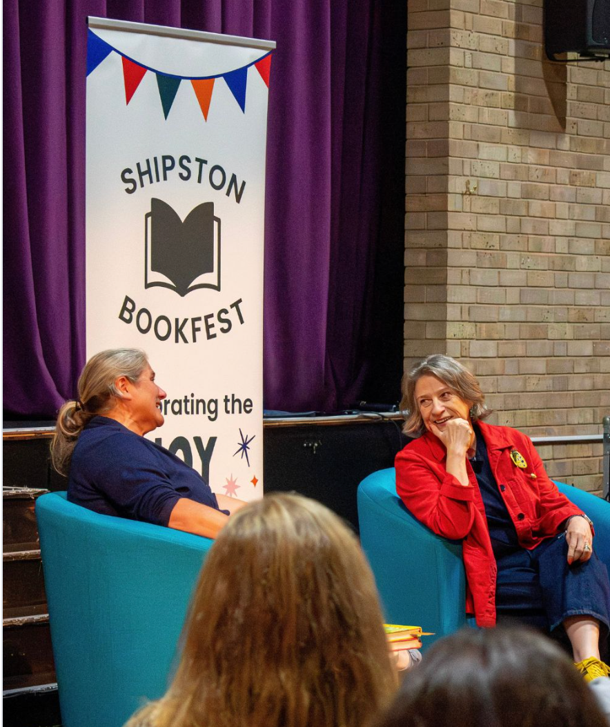 Caroline Mills interviewing Caroline Quentin at a book festival