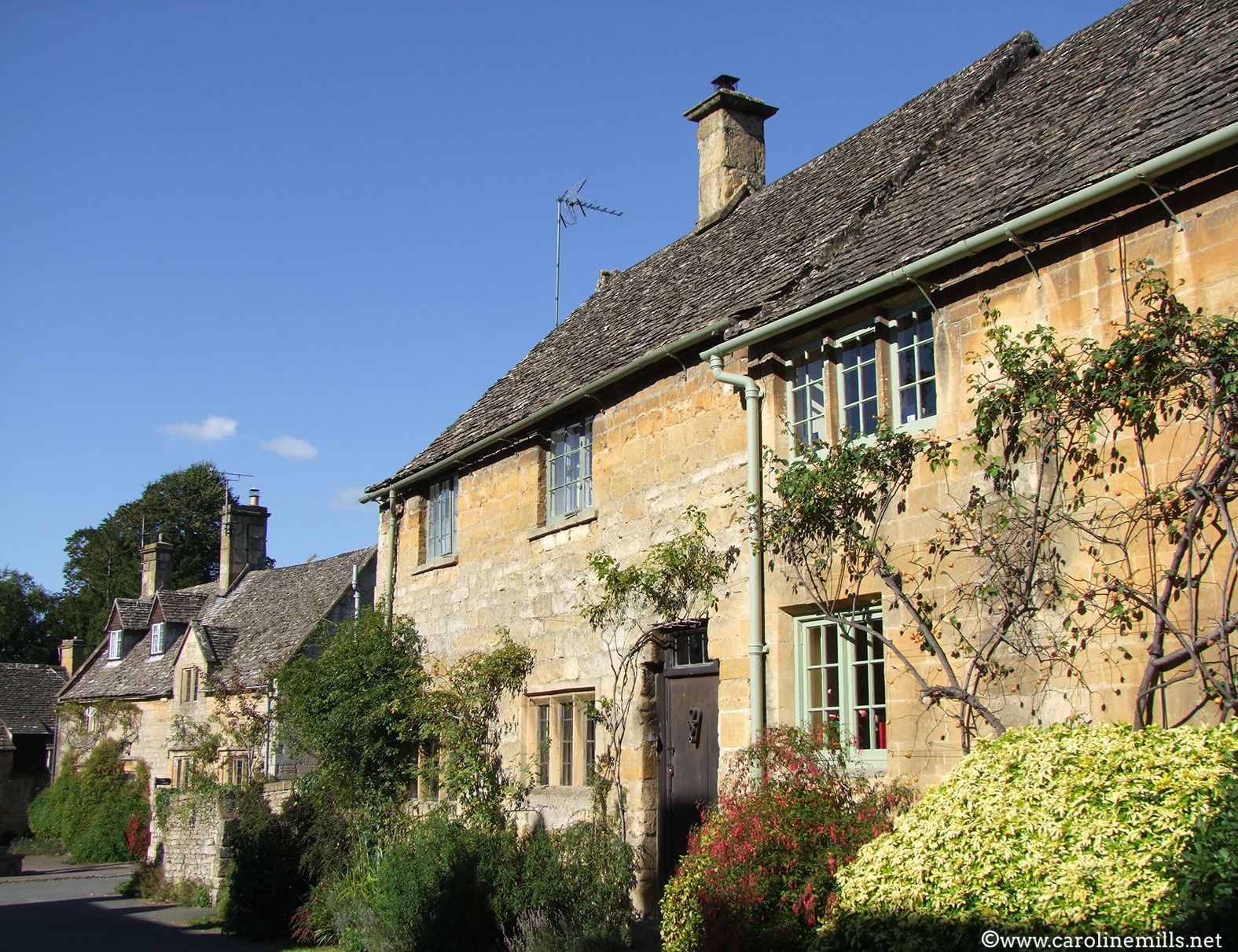A house with a chimney on the top of it