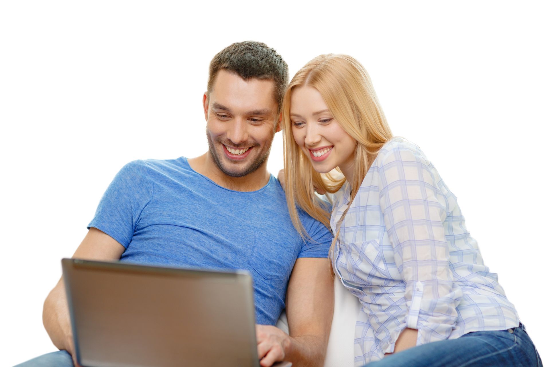 Two people smiling and looking at a laptop together