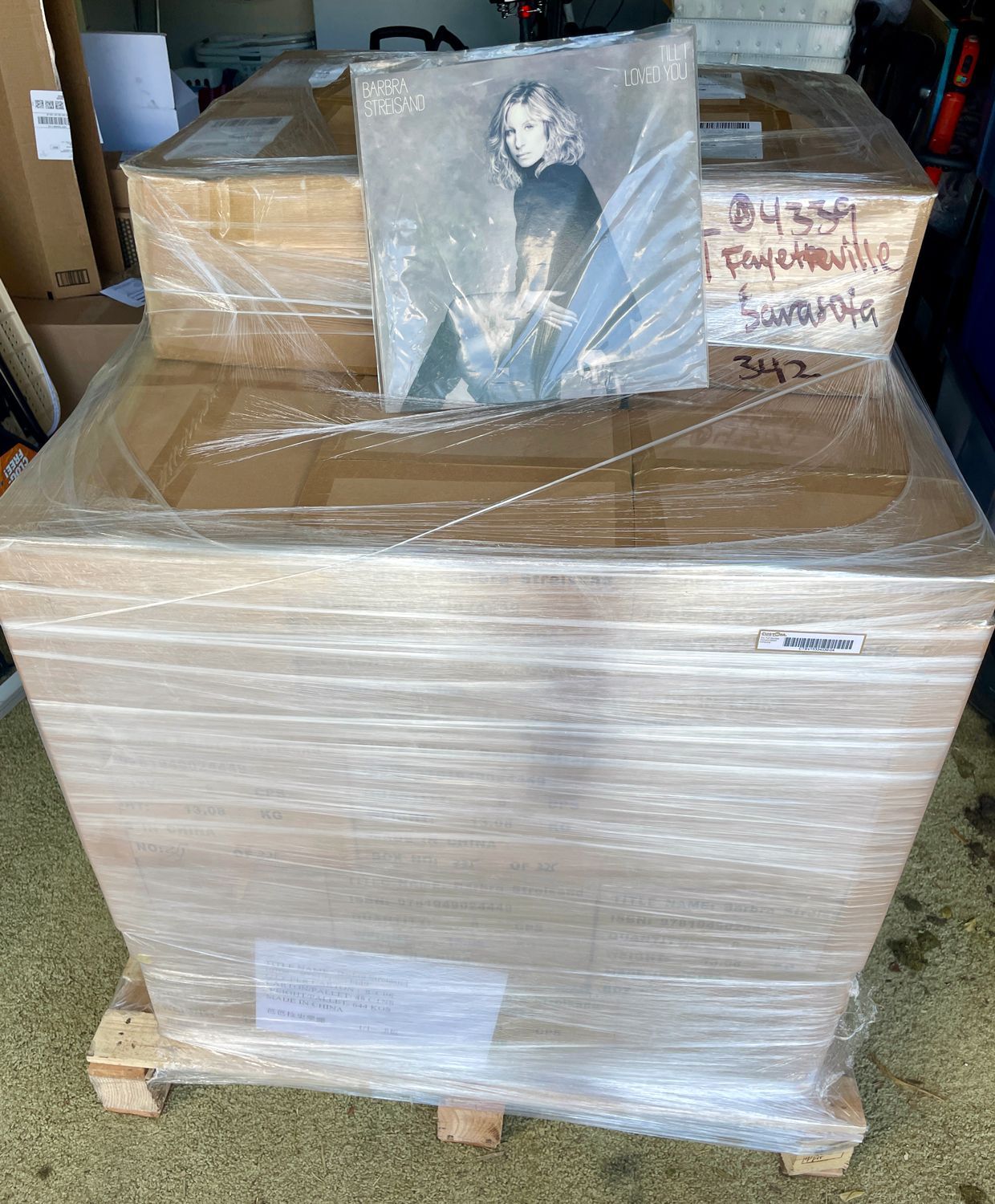 stack of Matt's books in shrink-wrap, ready to ship