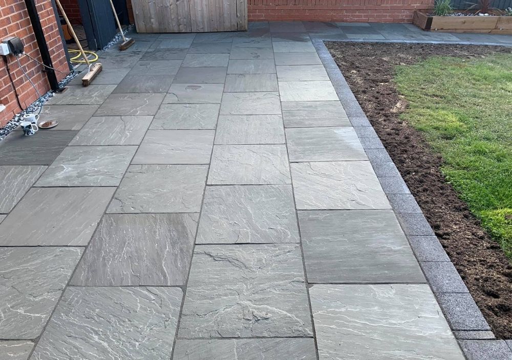 Grey sandstone paving