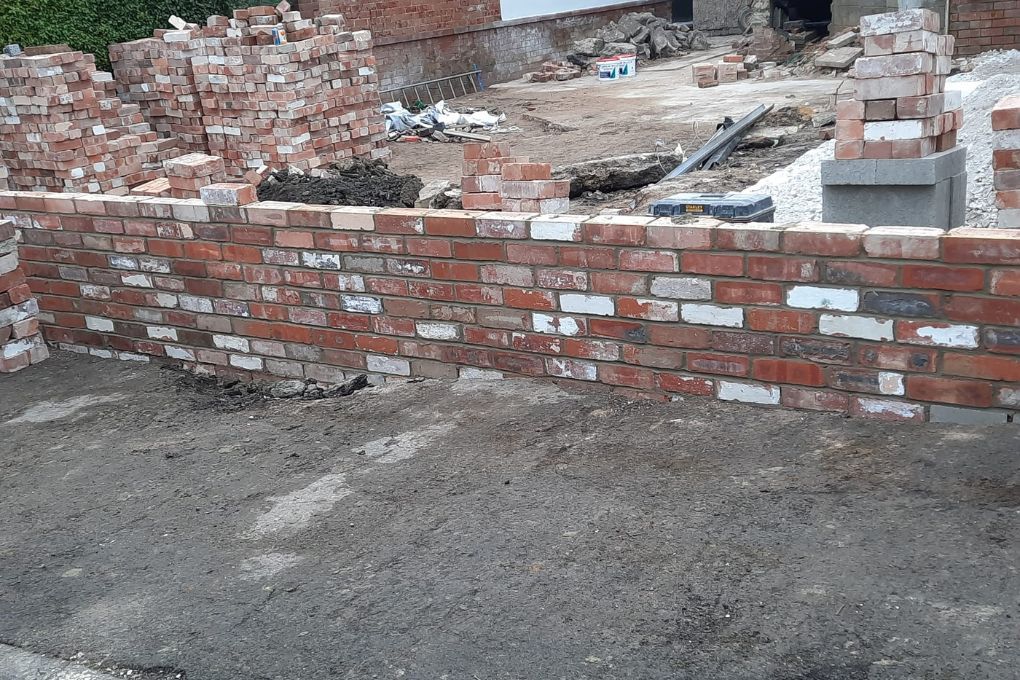 Brick retaining wall being built at a property in Leeds