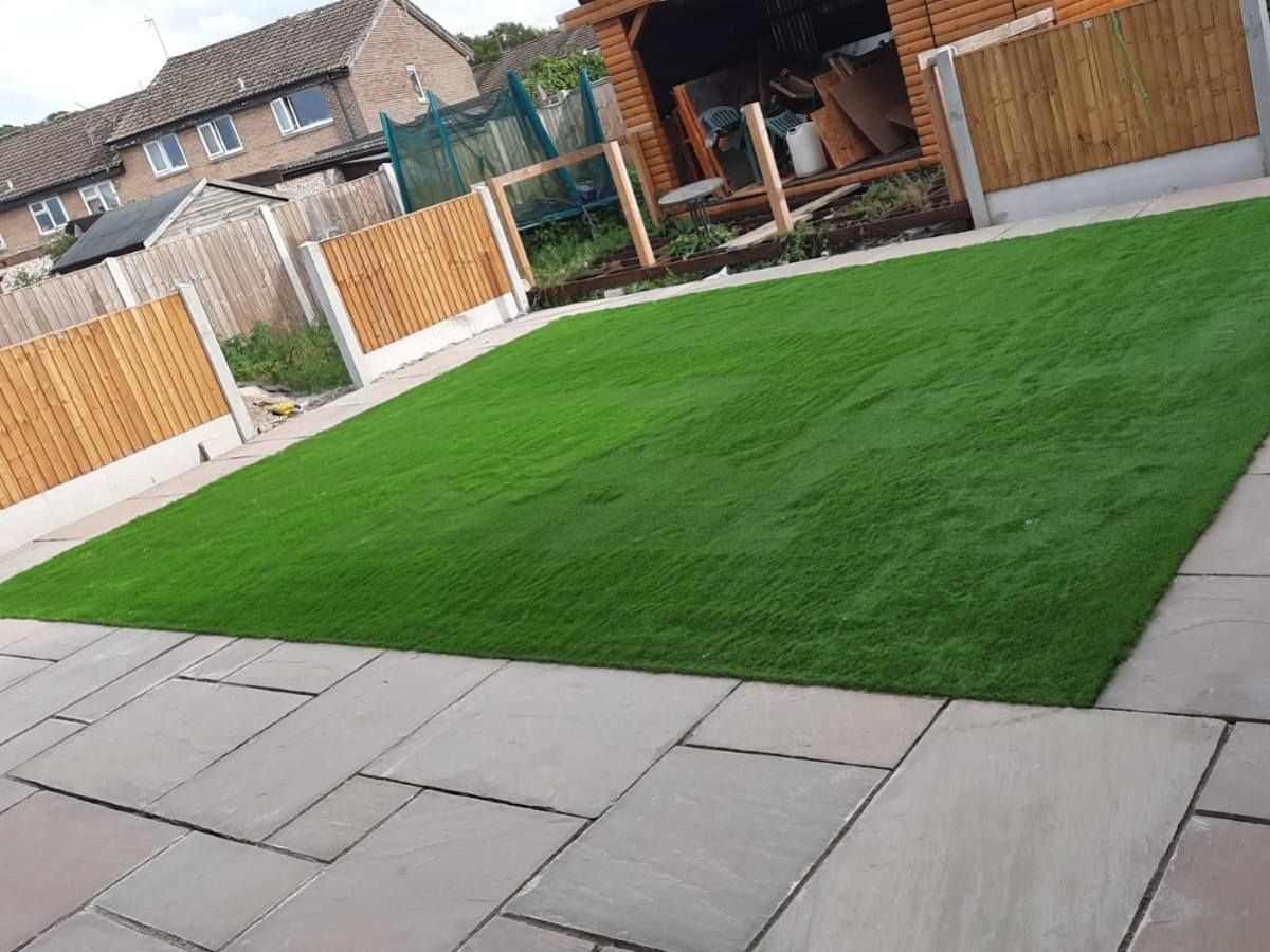 Paving Leeds artificial grass installation in Leeds with paving surround